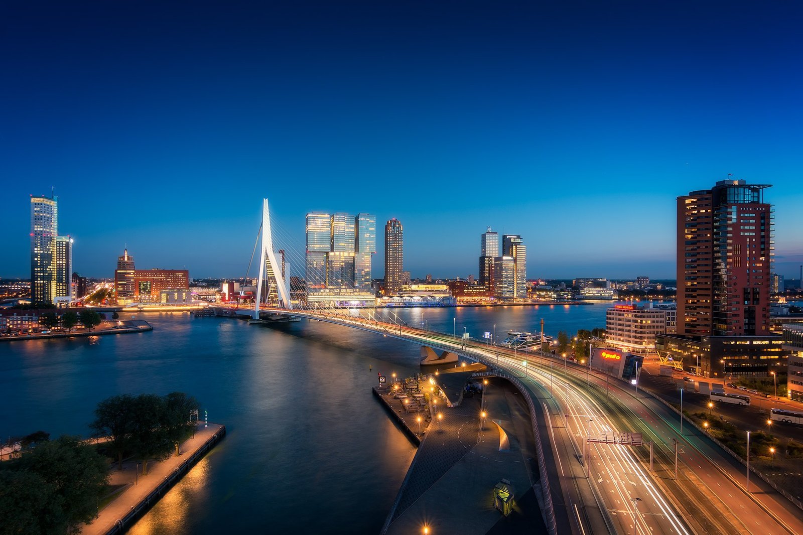 Rotterdam skyline Netherlands with city lights and riverside view